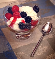 Vanilla Ice Cream with fresh Raspberries, Blackberries, and Raspberry Sauce