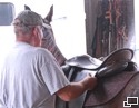 Pat saddles up a Tennessee Walker